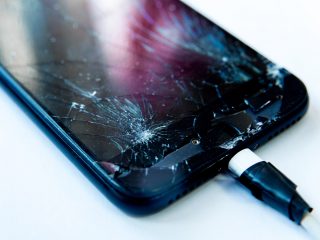 cell phone with screen broken by hammer non warranty repairs concept 1