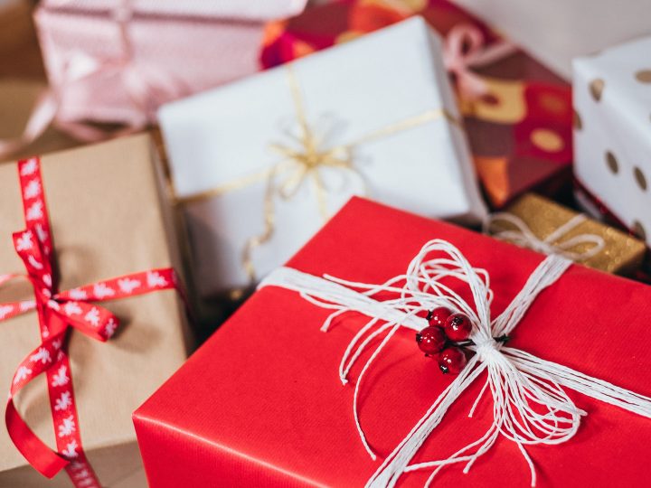 Christmas gifts wrapped in red paper