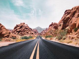 road through mountains in the desert